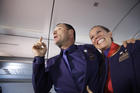 Flight attendants Carlos Ciuffardi, left, and Paola Podest, talk with journalists during a flight from Santiago, Chile, to Iquique, Chile, after Pope Francis married them in-flight early Thursday, Jan. 18, 2018. (AP Photo/Alessandra Tarantino)