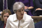 Britain's Prime Minister Theresa May makes a statement in the House of Commons on April 16 regarding her decision to join air strikes against Syria. (PA via AP)