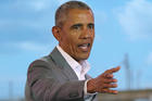 Former US President Barack Obama gestures to the crowd, during an event in Kogelo, Kisumu, Kenya, Monday, July 16, 2018. (AP Photo Brian Inganga)