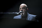 Musician Billy Joel performs during his 100th lifetime performance at Madison Square Garden on Wednesday, July 18, 2018, in New York. (Photo by Evan Agostini/Invision/AP)
