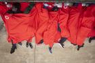 Migrants rest at the port of Tarifa, southern Spain, on July 27 after being rescued by Spain's Maritime Rescue Service. Authorities said 751 migrants were rescued from 52 dinghies trying to reach Spanish shores from northern Africa, this year's most popular route into Europe for human traffickers. (AP Photo/Marcos Moreno)