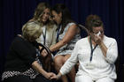 Victims of clergy sexual abuse and their family members listen as Pennsylvania Attorney General Josh Shapiro speaks about a grand jury’s investigation of clergy sexual abuse. (AP Photo/Matt Rourke)