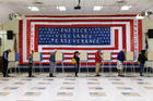 Voters cast their ballots at Robious Elementary School in Chesterfield, Va., on Tuesday, November 6, 2018. (Daniel Sangjib Min/Richmond Times-Dispatch via AP)