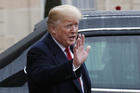 U.S President Donald Trump gestures outside the Elysee Palace after his talks with French President Emmanuel Macron in Paris on Nov. 10. (AP Photo/Thibault Camus)