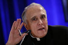 Cardinal Daniel DiNardo listens to a reporter's question during a news conference during the USCCB's annual fall meeting, in Baltimore in November. (AP Photo/Patrick Semansky, file)