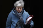 The staggering parliamentary defeat for Prime Minister Theresa May, seen here leaving 10 Downing Street on Jan. 23, pushed the country even further from safe dry land. (AP Photo/Alastair Grant)