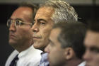 In this July 30, 2008, file photo, Jeffrey Epstein, center, appears in court in West Palm Beach, Fla. Mr. Epstein pled guilty in 2008 for soliciting a minor for prostitution and now faces new charges in New York of sex trafficking. (Uma Sanghvi/Palm Beach Post via AP, File)