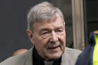 In this Feb. 26, 2019, photo, Cardinal George Pell leaves the County Court in Melbourne, Australia. Pell’s lawyers argued in his appeal that there were more than a dozen “solid obstacles” that should have prevented a jury from finding him guilty beyond a reasonable doubt of molesting two choirboys. The appeal court will give their verdict on Aug. 21. (AP Photo/Andy Brownbill)