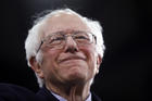 Democratic presidential candidate Sen. Bernie Sanders, I-Vt., speaks to supporters at a primary night election rally in Manchester, N.H., Tuesday, Feb. 11, 2020. (AP Photo/Matt Rourke)