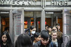 Students at New York City's Stuyvesant High School leave classes on March 13. Schools in New York City have since been closed for the rest of the academic year. (AP Photo/Bebeto Matthews, File)