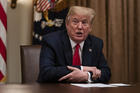 President Donald Trump speaks during a meeting with business leaders on coronavirus testing, in the Cabinet Room of the White House, Monday, April 27, 2020, in Washington. (AP Photo/Evan Vucci)
