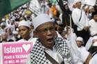 A muslim protester shouts slogans during a protest against Jakarta's Christian Governor Basuki "Ahok" Tjahaja Purnama in Jakarta, Indonesia, on Friday, May 5, 2017. (AP Photo/Achmad Ibrahim)