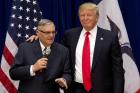 In this Jan. 26, 2016 photo, then-Republican presidential candidate Donald Trump is joined by Joe Arpaio, the sheriff of metro Phoenix, at a campaign event in Marshalltown, Iowa (AP Photo/Mary Altaffer).