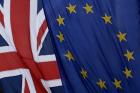 A European and British Union flags hang outside Europe House, the European Parliament's British offices, in London, Tuesday, March 14, 2017. (AP Photo/Matt Dunham)