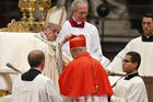  Pope Francis places a red biretta on new Cardinal Pedro Barreto of Huancayo, Peru, during a consistory to create 14 new cardinals in St. Peter's Basilica at the Vatican June 28. (CNS photo/Paul Haring)