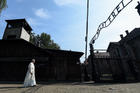 Pope Francis enters the main gate of the Auschwitz Nazi death camp in Oswiecim, Poland, July 29, 2016 (CNS photo/Alessia Giuliani, pool).