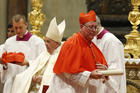New Cardinal Jean-Claude Hollerich of Luxembourg carries his scroll after being made a cardinal by Pope Francis during a consistory in St. Peter's Basilica at the Vatican Oct. 5, 2019. (CNS photo/Paul Haring)