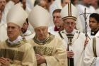 Pope Francis leaves in procession after celebrating Holy Thursday chrism Mass in St. Peter's Basilica at the Vatican April 13 (CNS photo/Paul Haring).