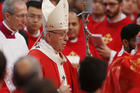  Pope Francis arrives in procession to celebrate Mass marking the feast of Pentecost in St. Peter's Basilica at the Vatican May 20. The pope at his "Regina Coeli" announced that he will create 14 new cardinals June 29. (CNS photo/Paul Haring)