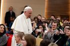 Pope Francis prepares to take a photo with young people at a presynod gathering of youth delegates in Rome March 19.  (CNS photo/Paul Haring) 