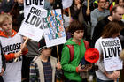 Young demonstrators gather outside Parliament in London Oct. 24 to call for more child refugees to be allowed asylum and safe passage to the United Kingdom. (CNS photo/Mary Turner, Reuters)