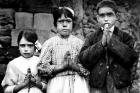 Portuguese shepherd children Lucia dos Santos, center, and her cousins, Jacinta and Francisco Marto, are seen in a file photo taken around the time of the 1917 apparitions of Mary at Fatima. (CNS photo/EPA)