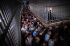People cross into Jerusalem from the West Bank through Checkpoint 300 (CNS photo/courtesy Sean Hawkey, World Council of Churches).