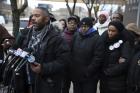 Kofi Ademola, left, of the group Black Lives Matter Chicago, and other protesters talk to the media outside the Chicago Police District 1 headquarters on South State Street in Chicago on Jan. 13. Speakers said Chicagoans already knew from experience what the Department of Justice said in its report critical of the Chicago Police department. (Terrence Antonio James/Chicago Tribune via AP)