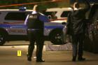 In this May 30, 2016 file photo, police work the scene where a man was fatally shot in the chest in Chicago (E. Jason Wambsgans/Chicago Tribune via AP).