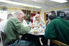 Inmates share a meal at a spiritual retreat held by Thrive for Life at the Otisville Correctional Facility in Otisville, N.Y. (photo courtesy of Thrive for Life)