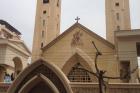 Relatives and onlookers gather outside a church after a bomb attack in the Nile Delta town of Tanta, Egypt, Sunday, April 9, 2017. The attack took place on Palm Sunday, the start of the Holy Week leading up to Easter, when the church in the Nile Delta town of Tanta was packed with worshippers. (AP Photo/Ahmed Hatem)