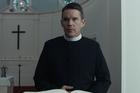 Reverend Toller is a cleric cut from the cloth of Graham Greene’s “whiskey priest” (photo: A24). 