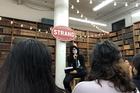 Atticus reading at The Strand bookstore in New York City.