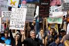 Counterprotesters hold signs and shout slogans during an anti-Shariah rally in Seattle on June 10, 2017. Photo courtesy of Reuters/David Ryder