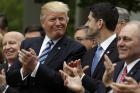 President Donald Trump joins House Speaker Paul Ryan of Wis., in the Rose Garden of the White House in Washington, Thursday, May 4, 2017, after the House pushed through a health care bill. (AP Photo/Evan Vucci)