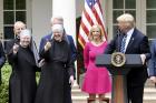 U.S President Donald Trump with members of the Little Sisters of the Poor in the White House rose garden on May 4 (Photo by Olivier Douliery/ Abaca (Sipa via AP Images)