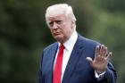 President Donald Trump waves as he arrives on the South Lawn of the White House in Washington, Monday, Aug. 14, 2017. Trump is returning from a vacation to Bedminster, N.J. (AP Photo/Alex Brandon)