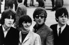 A DAY IN THEIR LIVES. The Beatles in an undated photo from Capitol Records.