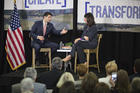 House Speaker Paul Ryan, R-Wis., talks with Heather Reynolds, CEO and president of Catholic Charities Fort Worth, Texas, during a town hall meeting on poverty April 3 at the charity's Fort Worth campus.