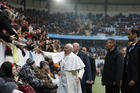 Pope Francis greets people before celebrating Mass at the Swedbank Stadium in Malmo, Sweden, Nov. 1 (CNS photo/Paul Haring).