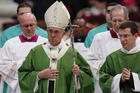 Pope Francis leaves after celebrating the closing Mass of the Synod of Bishops on the family in St. Peter's Basilica at the Vatican, Oct. 25 (CNS photo/Paul Haring).