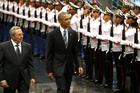 WALKING INTO HISTORY. Cuban President Raul Castro and U.S. President Barack Obama review Cuban soldiers during a welcome ceremony for Obama at the Palace of the Revolution in Havana, March 21 (CNS photo/Jonathan Ernst, Reuters).