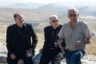 U.S. bishops listen as Israeli attorney gives explanation of land use around Jerusalem.