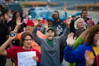 Protesters hold their hands in the air during an Aug. 16 demonstration against the shooting death of Michael Brown in Ferguson, Mo. The unarmed teen was shot and killed Aug. 9 by a police officer. (CNS photo/Lisa Johnston, St. Louis Review)