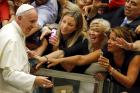 Pope Francis arrives to lead his weekly audience in Paul VI hall at the Vatican Aug. 5. (CNS photo/Giampiero Sposito, Reuters)