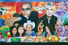 SERVANT-LEADERS. A mural of Óscar Romero and Rutilio Grande, S.J., in El Paisnal, El Salvador