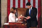 U.S. House Speaker Paul Ryan receives the gavel from House Democratic leader Nancy Pelosi on Jan. 3. (Jonathan Ernst/Reuters)
