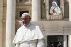 A tapestry of new St. Teresa of Kolkata is seen as Pope Francis leaves his general audience in St. Peter's Square at the Vatican Sept. 7. (CNS photo/Paul Haring)