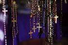 Rosaries hang among the personal possessions of genocide victims at a memorial inside the church in Ntarama, Rwanda. Some 5,000 people, mostly women and children, sought refuge near the church in April 1994, but were massacred by Hutu extremists.