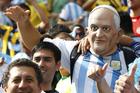 An Argentina fan wears a mask of Pope Francis as he attends the 2014 World Cup Group F final June 25, 2014, between Argentina and Nigeria at the Beira Rio stadium in Porto Alegre, Brazil. (CNS photo/Stefano Rellandini, Reuters) 